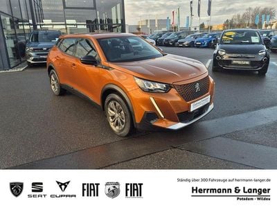 Gebraucht Peugeot e-2008 Active 100 kW (136 PS) 2022 Orange / orange fusion (metallic) SUV