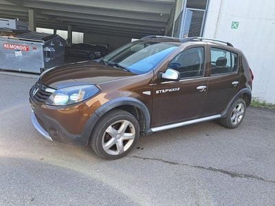 Gebraucht Dacia Sandero Stepway 105 PS (77 kW) 2012 Braun Van / Kleinbus