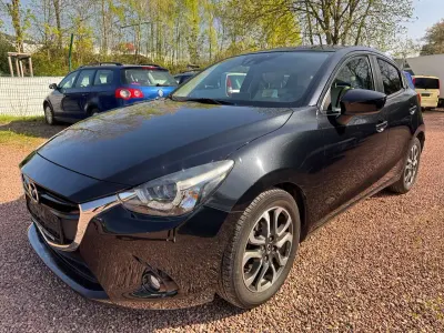 Używany Mazda 2 Edition 116 KM (85 kW) 2015 Czarny Sedan/Limuzyna