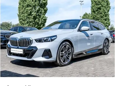 Second-hand BMW 550e Comfort Edition 489 CP (359 kW) 2025 Gri Break