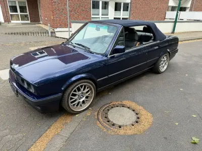 Gebraucht BMW 320 Cabriolet Sport Line 129 PS (94 kW) 1991 Blau Cabrio