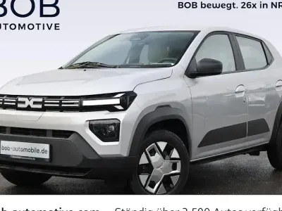 Gebraucht Dacia Spring Expression 52 kW (71 PS) 2025 Lightninggrau (grau) Kleinwagen