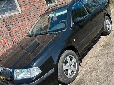 Używany Skoda Octavia 120 KM (88 kW) 2004 Czarny Kombi