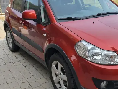Gebraucht Suzuki SX4 Comfort 107 PS (78 kW) 2007 Orange Limousine