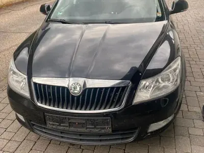 Używany Skoda Octavia Ambiente 160 KM (117 kW) 2010 Czarny Kombi