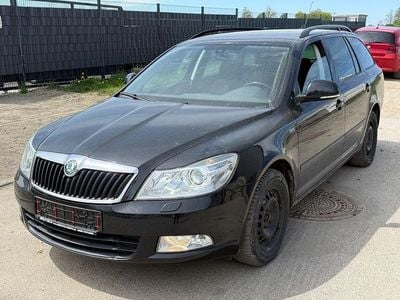 Second-hand Skoda Octavia Family 152 CP (111 kW) 2012 Negru Break