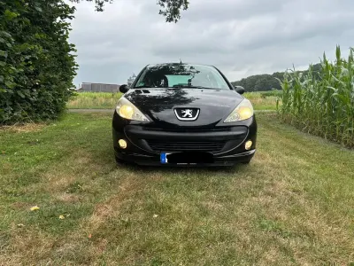Gebraucht Peugeot 206 60 PS (44 kW) 2010 Schwarz Limousine