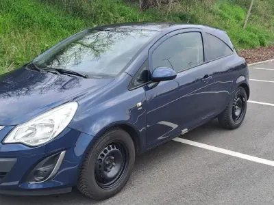Używany Opel Corsa Edition 69 KM (50 kW) 2011 Niebieski Hatchback