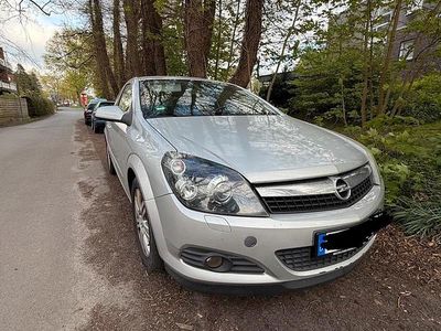 Second-hand Opel Astra GTC 150 CP (110 kW) 2009 Argintiu Coupe
