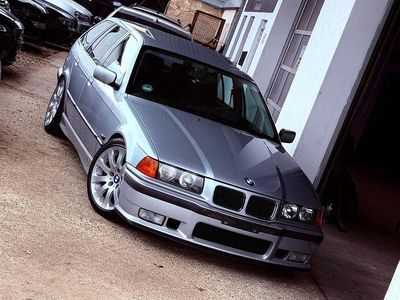 Second-hand BMW 320 Sport Line 150 CP (110 kW) 1996 Argintiu Break