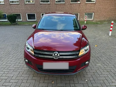 Używany VW Tiguan 122 KM (89 kW) 2012 Czerwony SUV