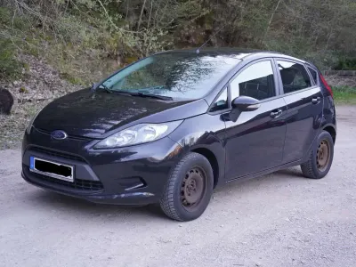 Gebraucht Ford Fiesta 82 PS (60 kW) 2011 Schwarz Limousine
