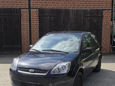 Second-hand Ford Fiesta Ambiente 60 CP (44 kW) 2006 Albastru Hatchback