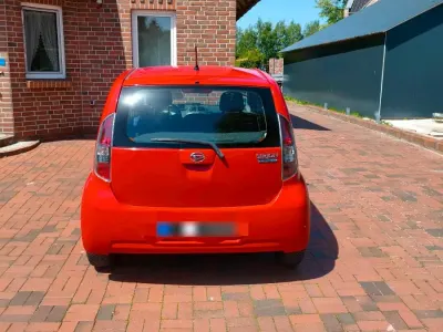 Gebraucht Daihatsu Sirion 69 PS (50 kW) 2012 Rot Kleinwagen