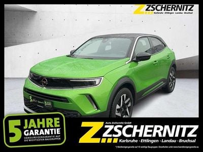 Gebraucht Opel Mokka-e Elegance 100 kW (136 PS) 2021 Matcha green/ikone gruen SUV