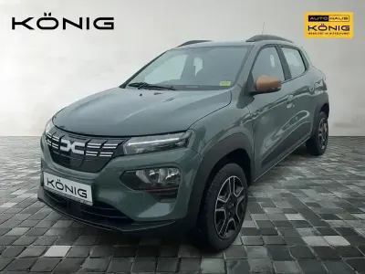 Gebraucht Dacia Spring Extreme 47 kW (65 PS) 2023 Grün "flechtengrau" Kleinwagen