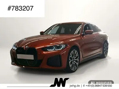 Gebraucht BMW i4 M Sport 210 kW (286 PS) 2023 Sunset orange metallic Limousine