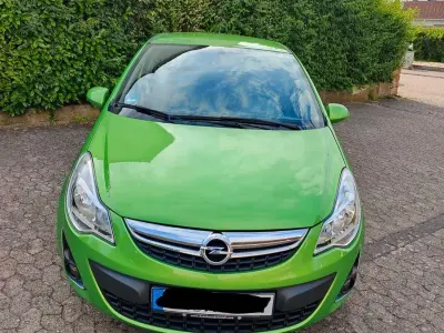 Gebraucht Opel Corsa Satellite 69 PS (50 kW) 2011 Grün Kleinwagen