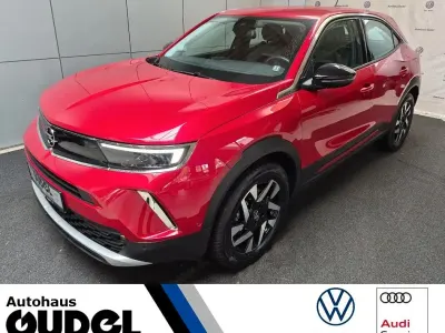 Używany Opel Mokka Elegance 100 kW (136 KM) 2023 Czerwony SUV