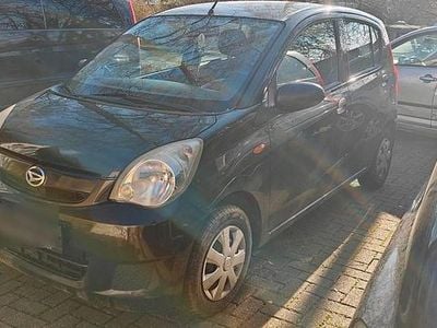 Gebraucht Daihatsu Cuore 70 PS (51 kW) 2010 Schwarz Kleinwagen