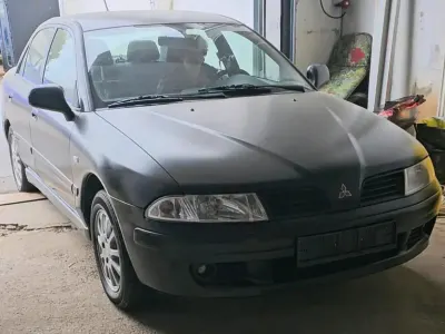 Gebraucht Mitsubishi Carisma 100 PS (73 kW) 2001 Schwarz Limousine