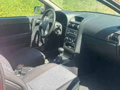 Second-hand Opel Astra 101 CP (74 kW) 1999 Negru Berlinǎ