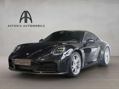 Gebraucht Porsche 911 Carrera 394 PS (289 kW) 2025 Tiefschwarz Coupé
