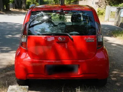 Gebraucht Daihatsu Sirion 69 PS (50 kW) 2009 Rot Kleinwagen