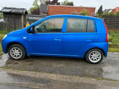 Gebraucht Daihatsu Cuore 58 PS (42 kW) 2005 Blau Kleinwagen
