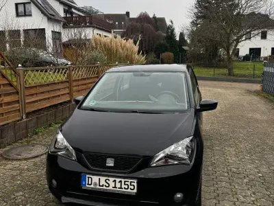 Używany Seat Mii Style 75 KM (55 kW) 2013 Czarny Hatchback