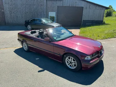 Gebraucht BMW 318 Basis 116 PS (85 kW) 1996 Rot Cabrio