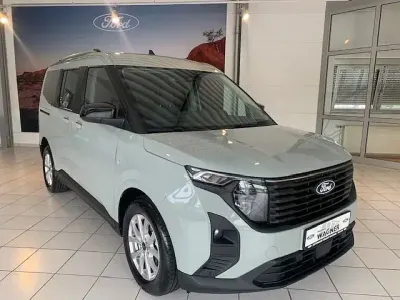Gebraucht Ford Tourneo Courier Titanium 125 PS (91 kW) 2025 Grau Van / Kleinbus