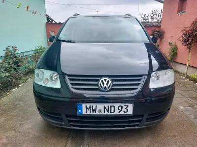 Używany VW Touran 105 KM (77 kW) 2006 Czarny Minivan