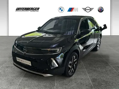 Gebraucht Opel Mokka-e Elegance 100 kW (136 PS) 2022 Diamant schwarz/karbon schwarz SUV