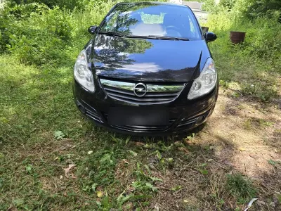 Gebraucht Opel Corsa 80 PS (58 kW) 2010 Schwarz Kleinwagen