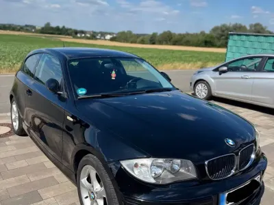 Gebraucht BMW 116 122 PS (89 kW) 2009 Schwarz Kleinwagen