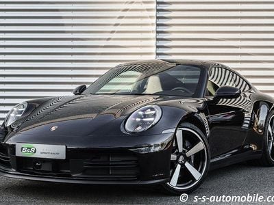 Gebraucht Porsche 911 Carrera Chrono 394 PS (289 kW) 2024 Tiefschwarz metallic Coupé