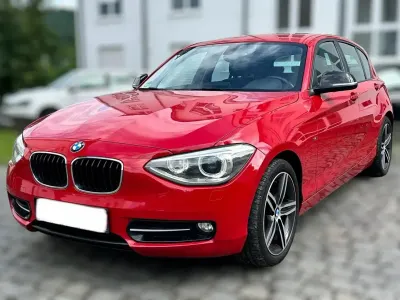 Gebraucht BMW 116 Sport Line 136 PS (100 kW) 2012 Rot Kleinwagen