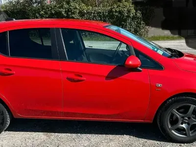 Używany Opel Corsa drive 90 KM (66 kW) 2016 Czerwony Hatchback