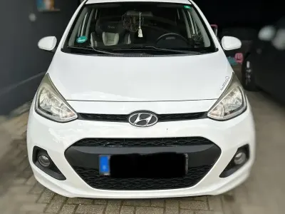 Gebraucht Hyundai i10 67 PS (49 kW) 2014 Weiß Kleinwagen