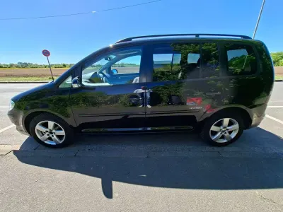 Gebraucht VW Touran United 105 PS (77 kW) 2009 Schwarz Van / Kleinbus