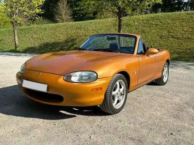 Używany Mazda MX5 110 KM (80 kW) 1998 Pomarańczowy Kabriolet