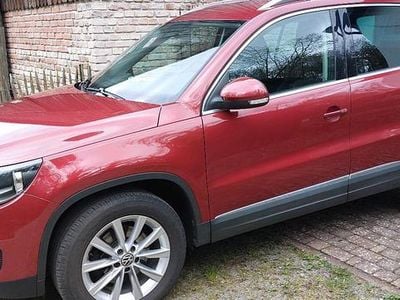 Second-hand VW Tiguan Sportline 160 CP (117 kW) 2012 Roșu SUV