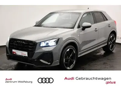 Gebraucht Audi Q2 S-Line 150 PS (110 kW) 2024 Nardograu (uni) SUV