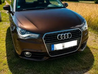 Gebraucht Audi A1 Attraction 90 PS (66 kW) 2013 Braun Kleinwagen