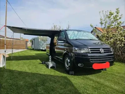 Second-hand VW T5 Highline 180 CP (132 kW) 2013 Negru Van