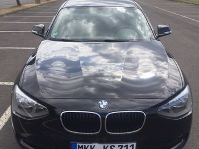 Gebraucht BMW 114 102 PS (75 kW) 2014 Schwarz metallic Kleinwagen