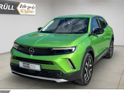 Gebraucht Opel Mokka Elegance 101 PS (74 kW) 2023 Grün (matcha green) SUV