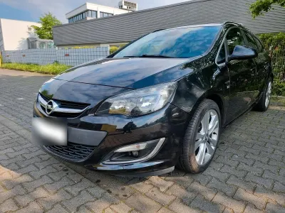 Używany Opel Astra OPC 136 KM (100 kW) 2014 Czarny Kombi