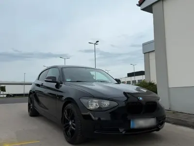 Używany BMW 116 Sport Line 136 KM (100 kW) 2012 Czarny Hatchback
